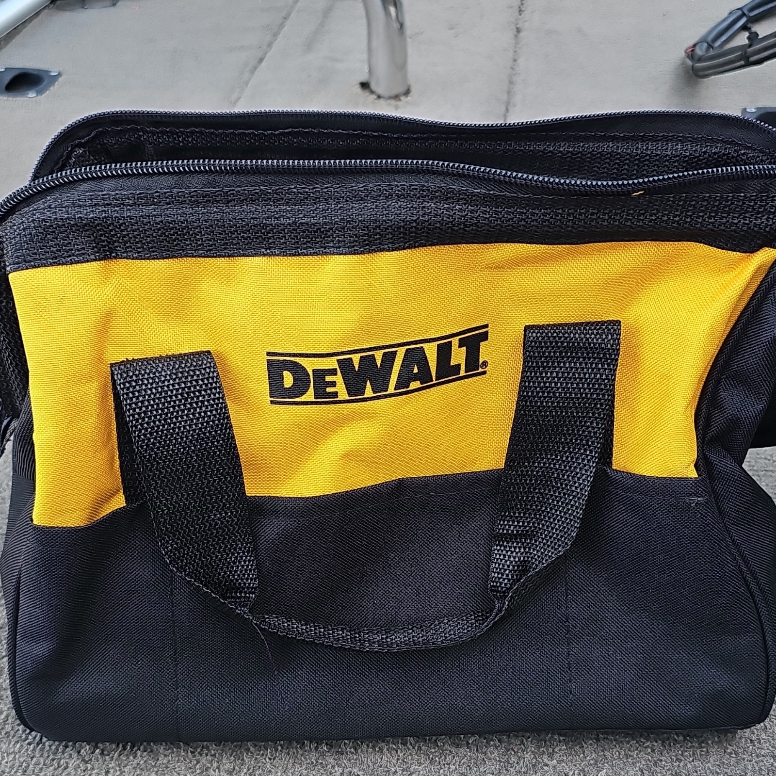 DEWALT Yellow/Black Fabric Tool Bag Zipper Closure with Carry Handles