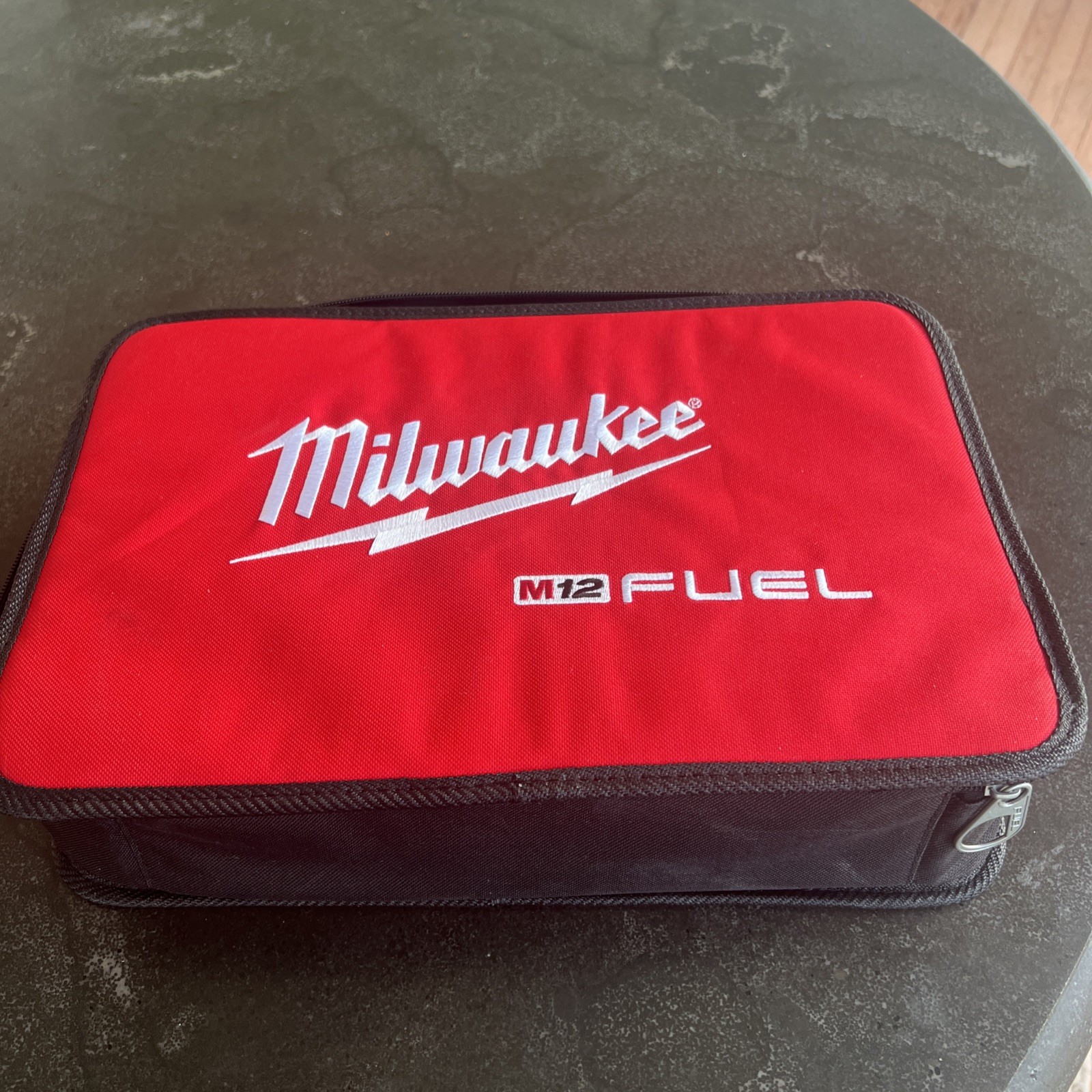 Milwaukee M12 FUEL 14″ Tool Bag and m12 charger