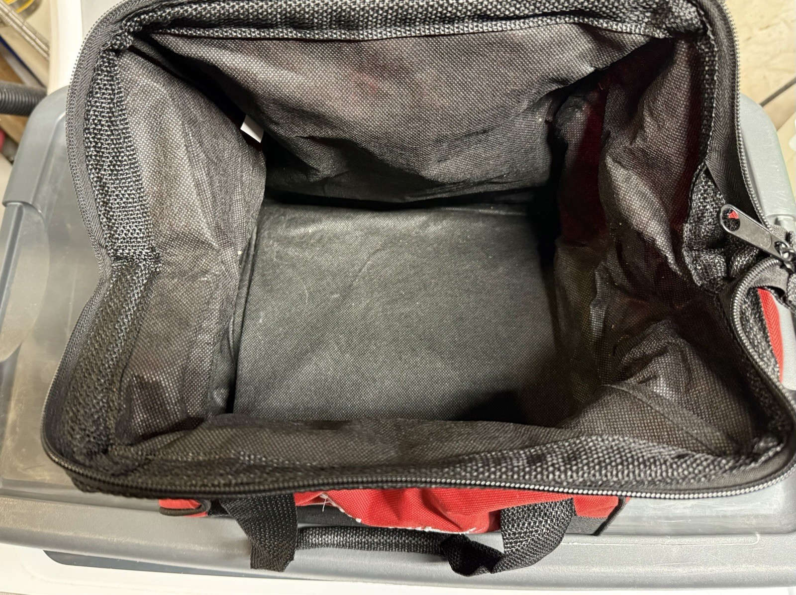 Milwaukee Red and Black Fabric Tool Bag with Handle and Zipper Closure